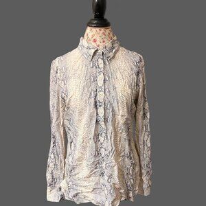 Blue and white snakeskin print button up shirt with a relaxed fit #westernvibes